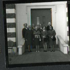 Eight unidentified women stand on the steps of John Knox Church, Rangiora, 1972 