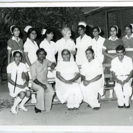Group portrait of Beryl Howie and unidentified nurses and an orderly, Ludhiana