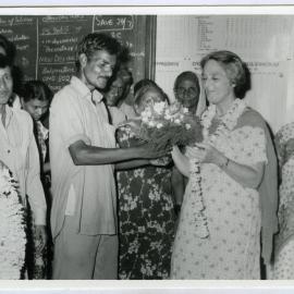 Beryl Howie accepting a bouquet of flowers from unidentified Indian man, Christian Medical College and Hospital, Ludhiana