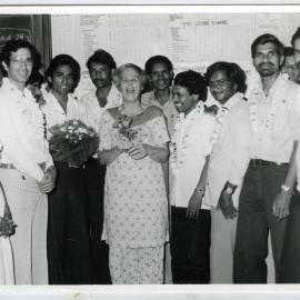 Beryl Howie stands among a group of unidentified Indian men, and one woman, Christian Medical College and Hospital