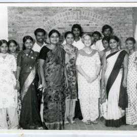 Beryl Howie stands among a group of unidentified Indian men and women, Christian Medical College and Hospital, Ludhiana