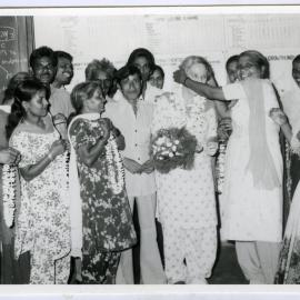An unidentified Indian woman touches Beryl Howie's head during Howie's farewell, Christian Medical College and Hospital, Ludhiana