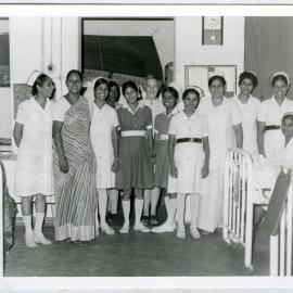 Beryl Howie stands in the background among nurses at the Christian Medical College and Hospital, Ludhiana