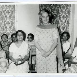 Beryl Howie stands among unidentified seated Indian women, Christian Medical College and Hospital, Ludhiana