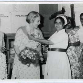 Beryl Howie accepting a garland from and unidentified Indian nurse, Christian Medical College and Hospital, Ludhiana