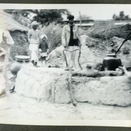 "Cooking the Dinner," Christmas Day, Milak, 1940 
