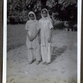 "Ready for school," two Indian girls 