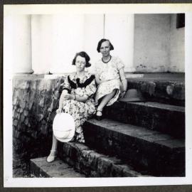 "Molly Ryburn and Mary Cole," seated on steps 