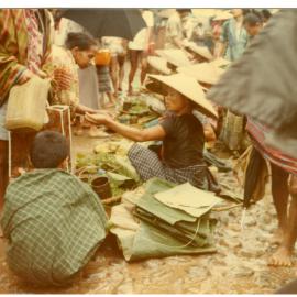 Woman Selling Banana and Bamboo Leaves at the Rantepao Market