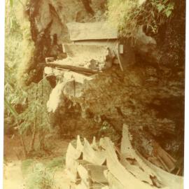 Coffins on a Wooden Ledge at Kete