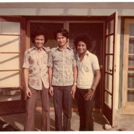 Ifer Sirima, Siskus Manabung and Ekson Tonoro Outside Siscus's Home