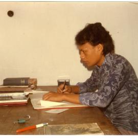 Desmon Kantjai at His Desk