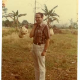 Robert Patterson Carrying Coconuts