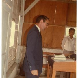 Robert Patterson at the Lectern in the Morning Service at Ujung Lamuru