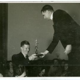 "Norm Jardine receiving Trophy from Reverend D. B. Martin," St. Andrew's Trophy, Dunedin 1948