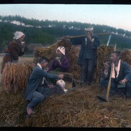 "Farmer taking refreshment in a rice field"