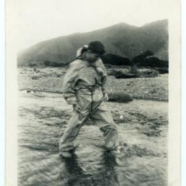 "Ross demonstrating how it works," The 1950 tramp to Orongorongo Valley, Presbyterian Harrier Club - Wellington