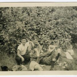 "2/5 co-operating with photographer,' The 1950 Tramp back to Orongorongo Valley, Presbyterian Harrier Club - Wellington