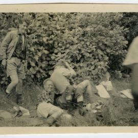 "Graham Miller demonstrates how to start a brawl," The 1950 Tramp back to the Orongorongo Valley, Presbyterian Harrier Club - Wellington
