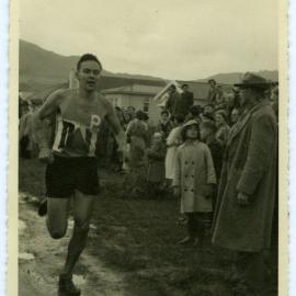 "Under new management, Lou Brennan of Wellington now running with Dunedin P. H. C." 