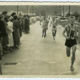 "Norm Wilcox (20th) finishing ahead of some of the Timaru boys," Presbyterian Harrier Club - Wellington