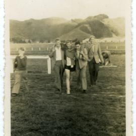 "Norm Wilcox being helped into the dressing rooms," 20 Mile Olympic Gold Cup, Trentham, Presbyterian Harrier Club - Wellington