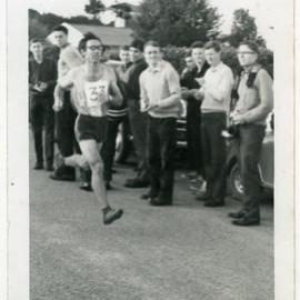 "Vince Dunbar (3rd), all up in the air about things," Club Championships, Johnsonville, 1964, Presbyterian Harrier Club - Wellington