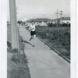 "Lyn Jones all alone approaching Taita," Masterton Relay, 1964, Presbyterian Harrier Club - Wellington