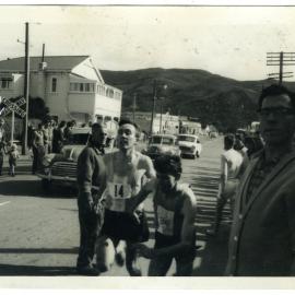 "Robin Gilchrist hands over to Ian Brown at Featherstone," Masterton Relay, 1964, Presbyterian Harrier Club - Wellington