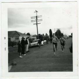 "Bob Sellers and Graeme Martin bouncing in to finish the Junior Anderson Rally Race at Dannevike, 1965, Presbyterian Harrier Club - Wellington