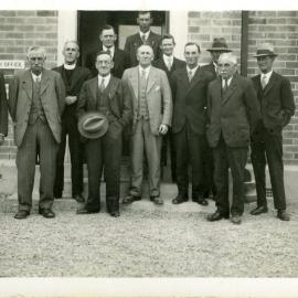 Men Outside Telegraph Office