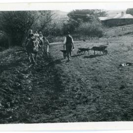 Making mud puddle for construction of Morrisons Church