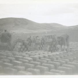 Stacking dried bricks