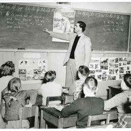 C.T. Styles gives a Bible in school lesson