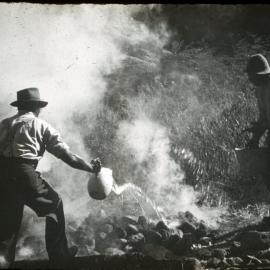 Pouring Water on a Hāngī