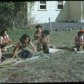 Māori Rangatahi from Onepu Mission School Work Weaving with Flax 