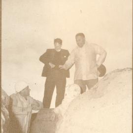 Four Men At A Construction Site