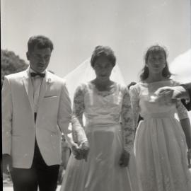 Wedding In Process - Bride, Groom, and Maid of Honor