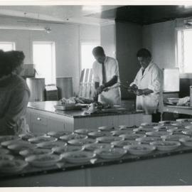 Carving The Meal In The Te Maungarongo kitchen at Ohope