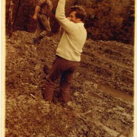 Two Unknown Men In The Dirt
