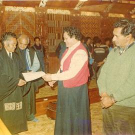 Two Standing In Front During A Service