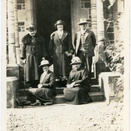 Unknown Group Of Five On The Steps of a Large Building