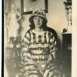 Unknown Young Woman In A Striped Dress