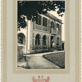 Dr. Kirk Standing In Front of the Kong Chuen Hospital