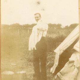 Dr John Kirk Holding An Infant