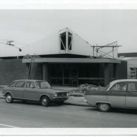 Two cars outside St. Andrew's Church in Balclutha
