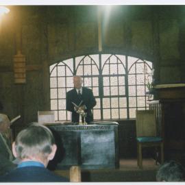 Russ Gillions speaking at the closing of Warrington Church