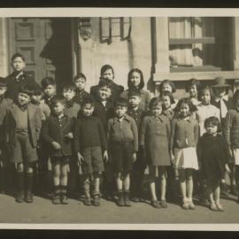 Group portrait of Chinese minister and children