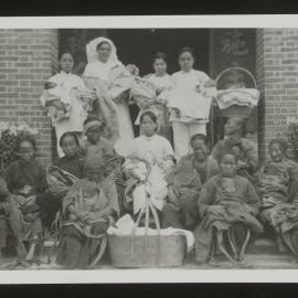 Nurses With Villagers & Babies.