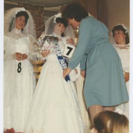 Presenting the winner's sash